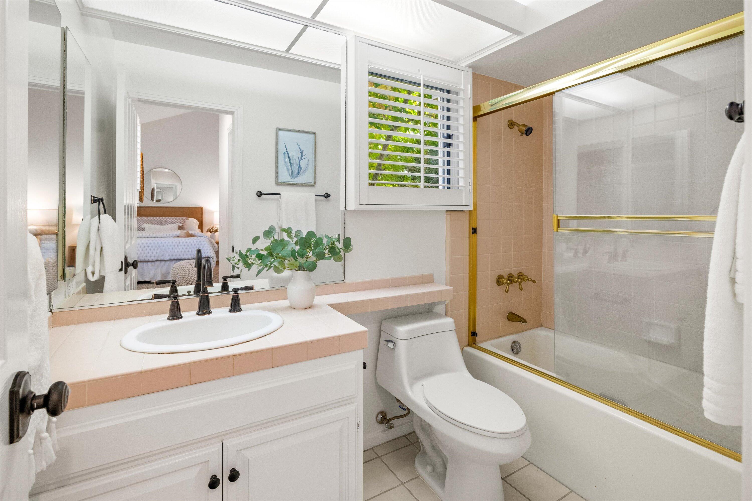 931 Weldon Road Santa Barbara, CA 93109 - Photo 19 of 32 a bathroom with a sink toilet and shower