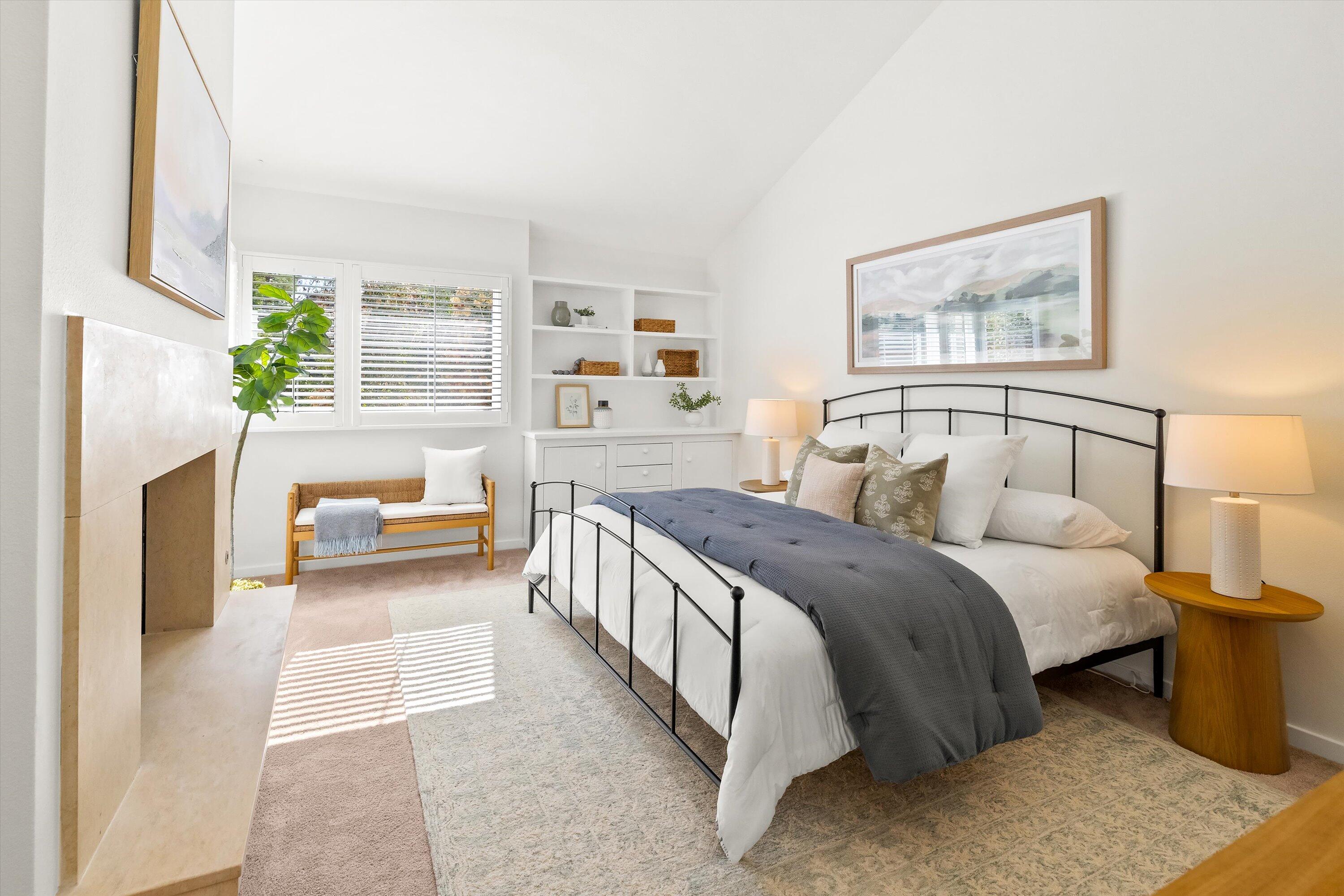 931 Weldon Road Santa Barbara, CA 93109 - Photo 21 of 32 a spacious bedroom with a bed and a couch