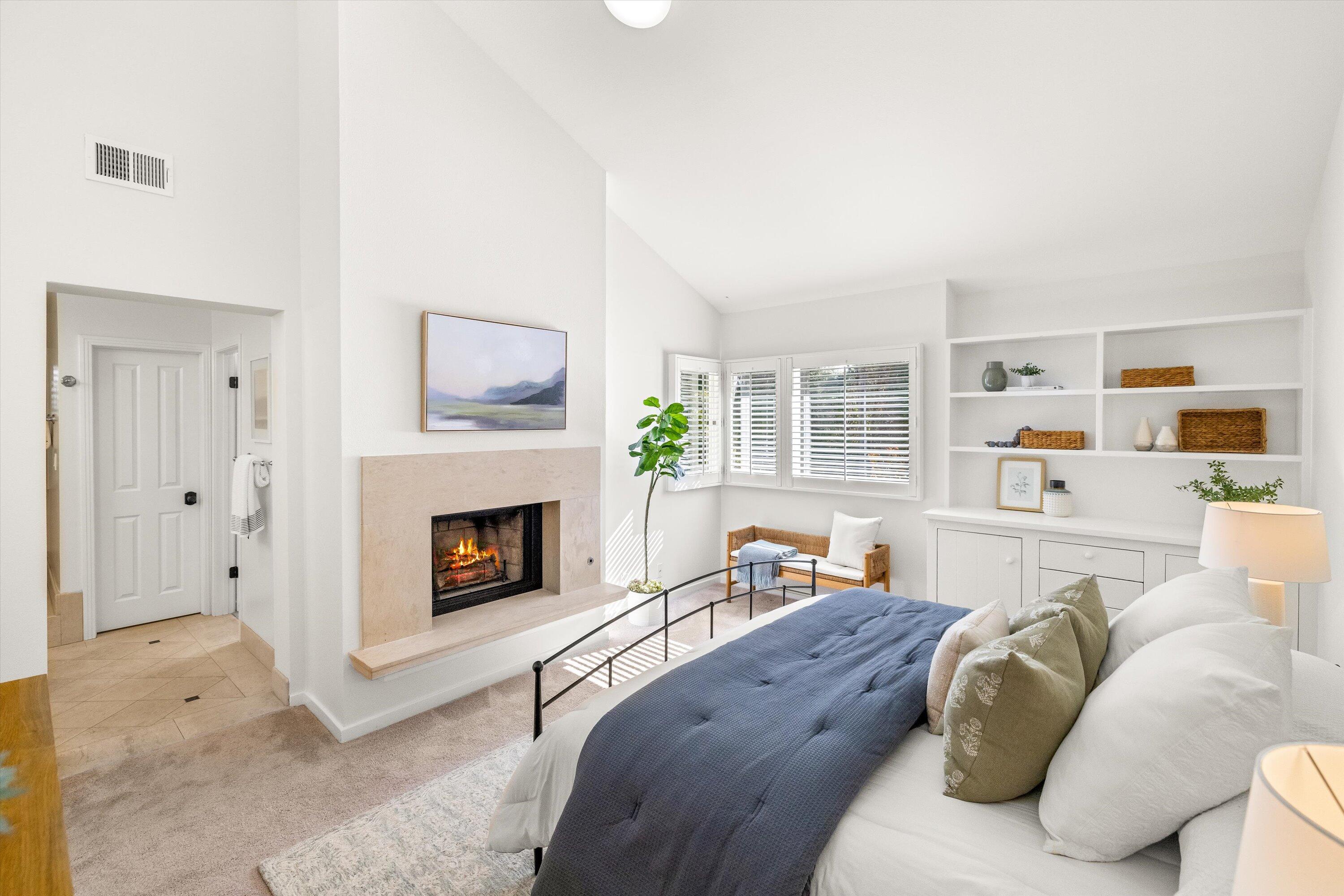 931 Weldon Road Santa Barbara, CA 93109 - Photo 22 of 32 a living room with furniture and a fireplace