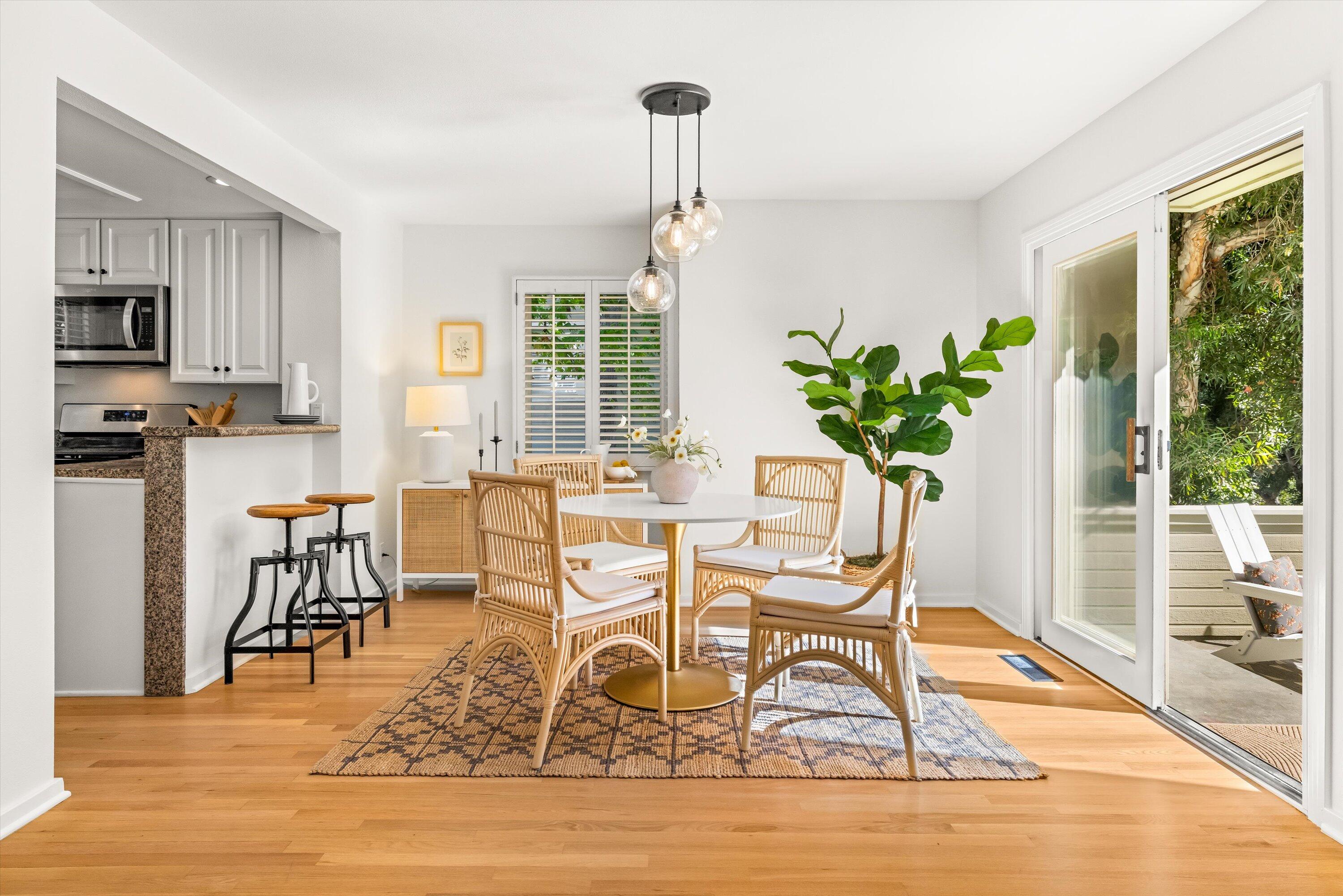 931 Weldon Road Santa Barbara, CA 93109 - Photo 4 of 32 a view of a dining room with furniture window and wooden floor