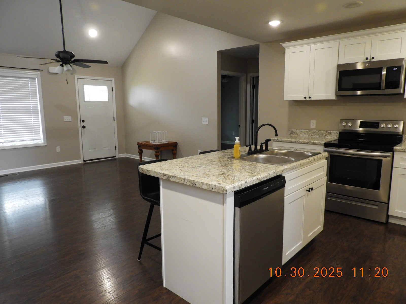 155 Poling Drive Pulaski, TN 38478 - Photo 18 of 36 a kitchen with a sink and a stove top oven
