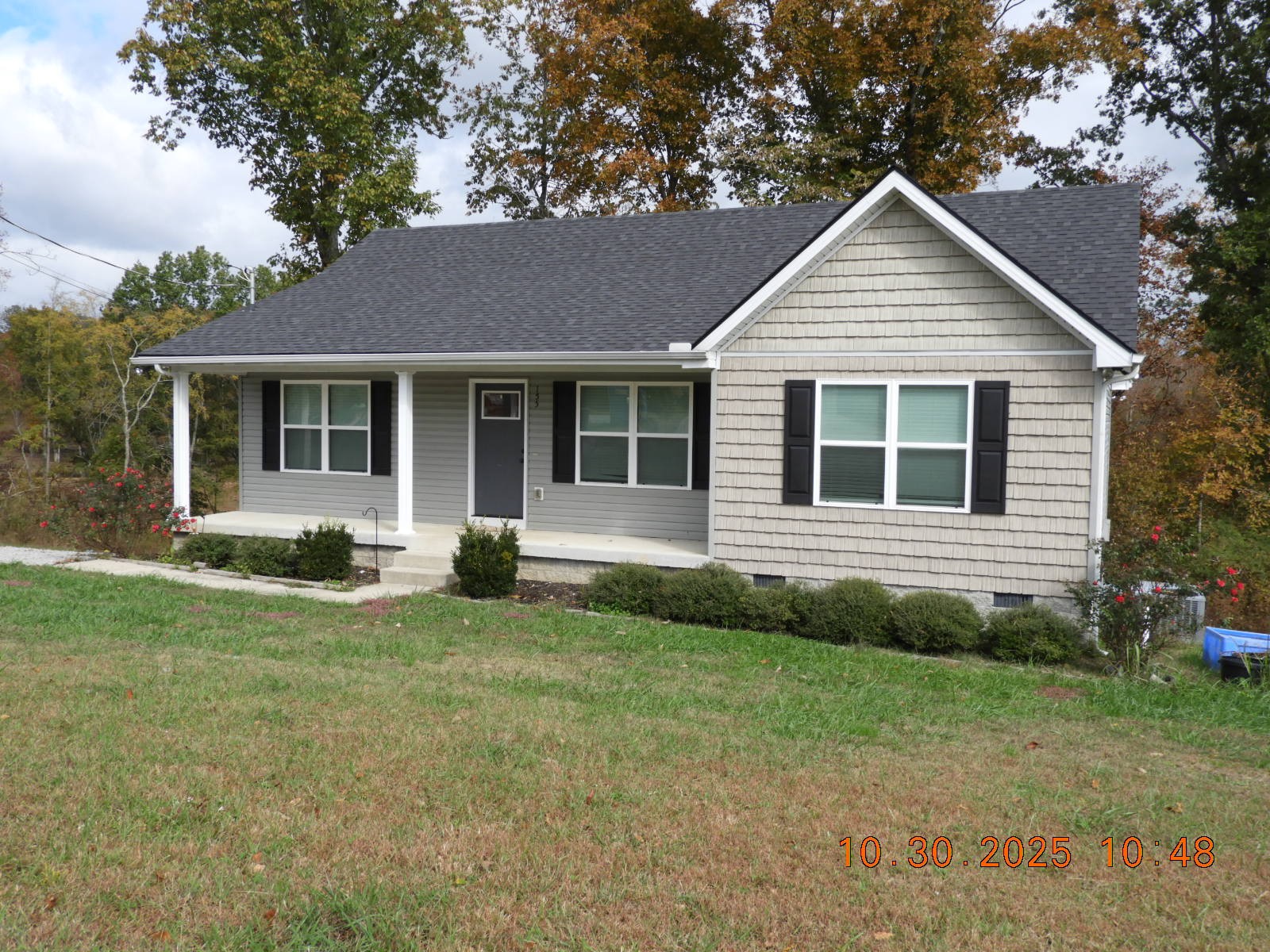 155 Poling Drive Pulaski, TN 38478 - Photo 2 of 36 a view of front of a house with a yard