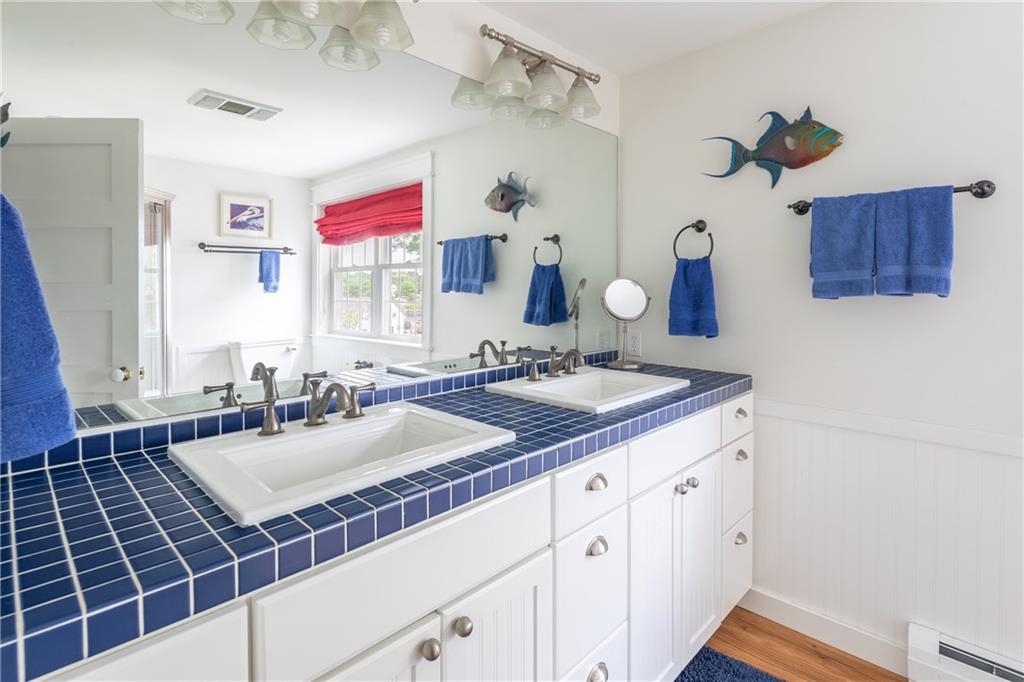 60 Lowells Cove Road Orrs Island, ME 04066 - Photo 15 of 27 The full bathroom upstairs continues...