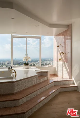 a view of living room with a floor to ceiling window and floor