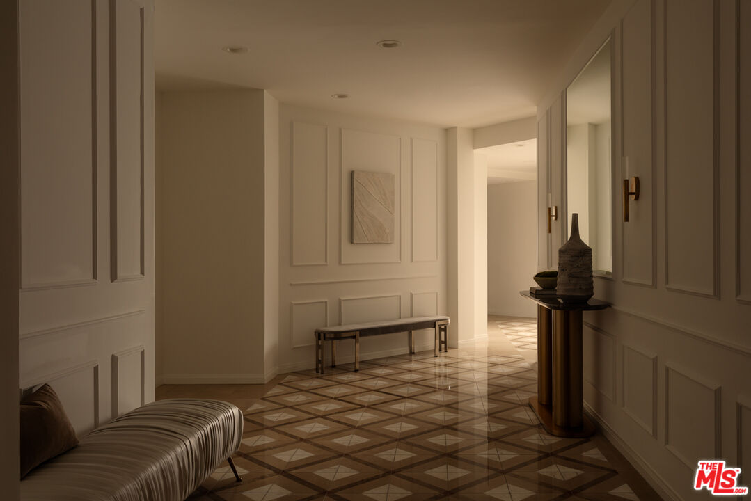 10724 Wilshire Boulevard, Unit 1501 Los Angeles, CA 90024 - Photo 2 of 38 a view of hallway with furniture and a window