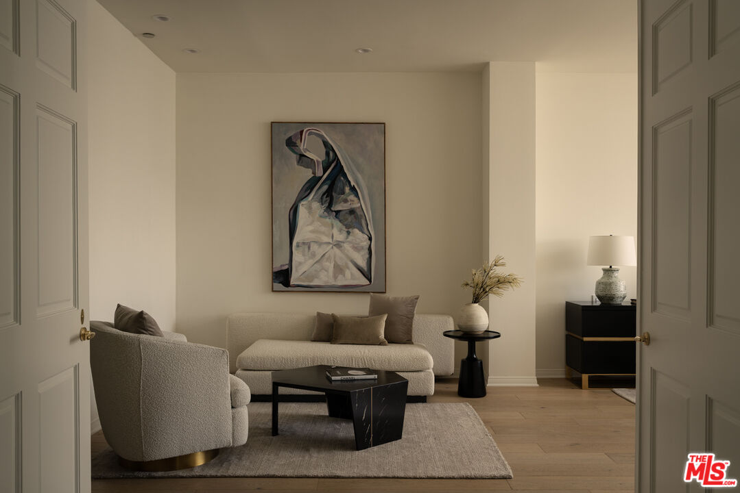 10724 Wilshire Boulevard, Unit 1501 Los Angeles, CA 90024 - Photo 23 of 38 a living room with furniture