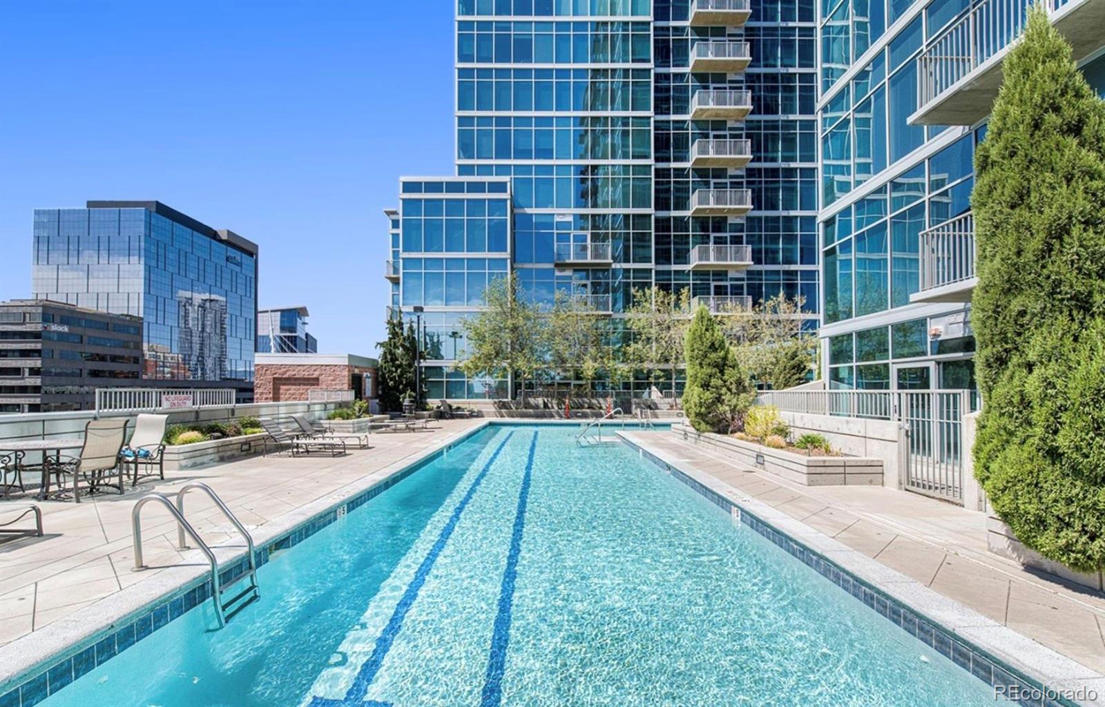 1700 Bassett Street, Unit 903 Denver, CO 80202 - Photo 4 of 31 a view of a swimming pool with a patio