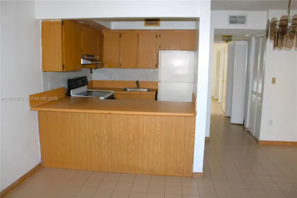 a utility room with washer and dryer