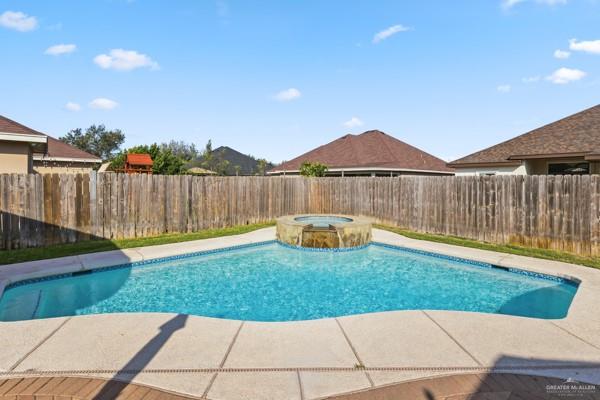 1405 Eva Street Edinburg, TX 78539 - Photo 17 of 18 a view of a garden with a slide