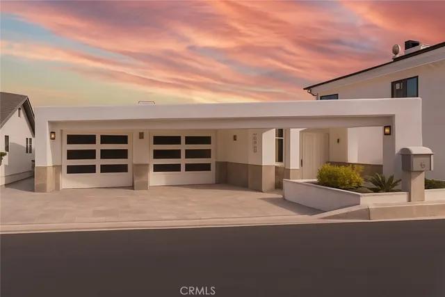 a view of a house with outdoor space and sitting area