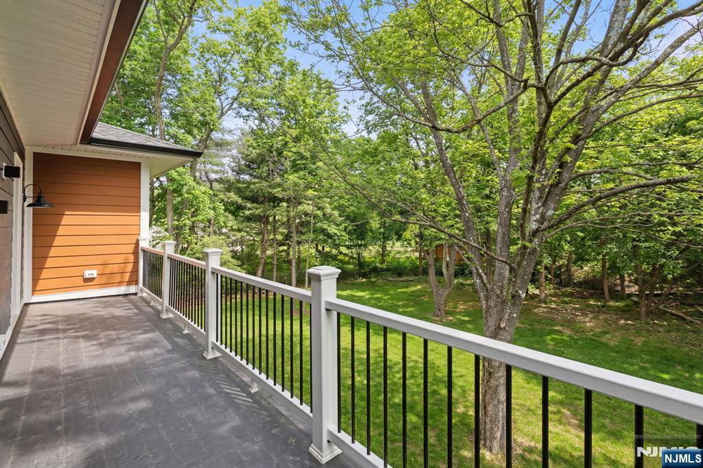 45 Riverview Terrace Mahwah, NJ 07430 - Photo 13 of 25 a view of a balcony with a tree