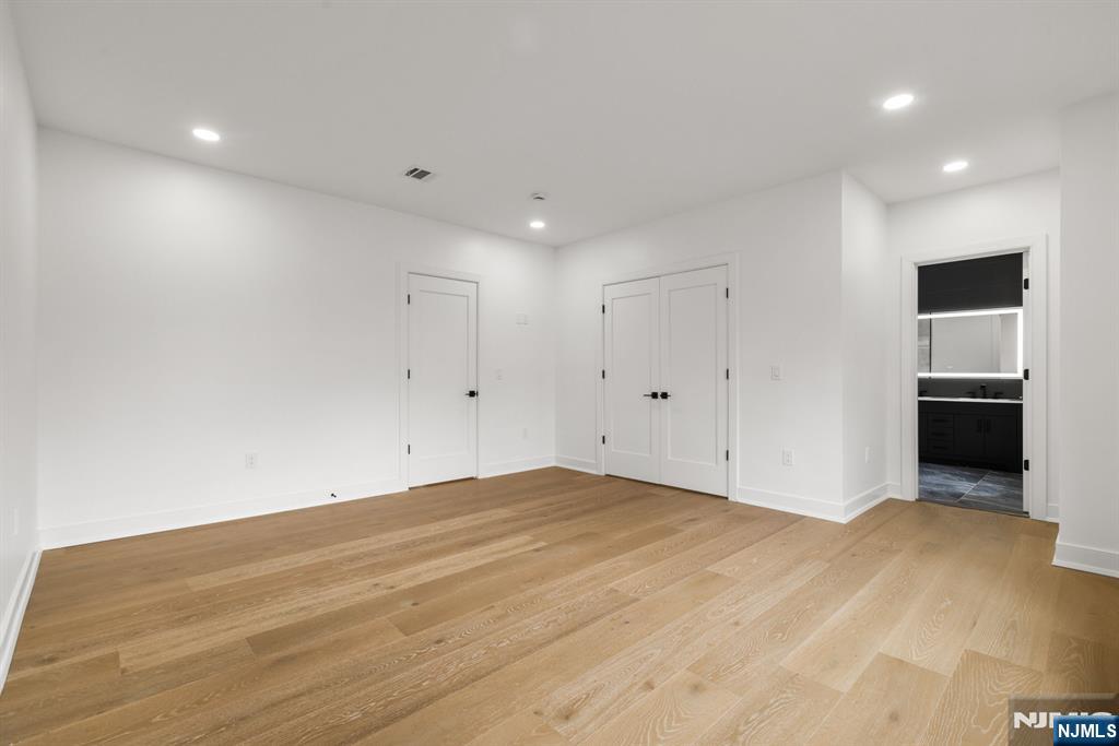 45 Riverview Terrace Mahwah, NJ 07430 - Photo 18 of 25 a view of empty room with wooden floor