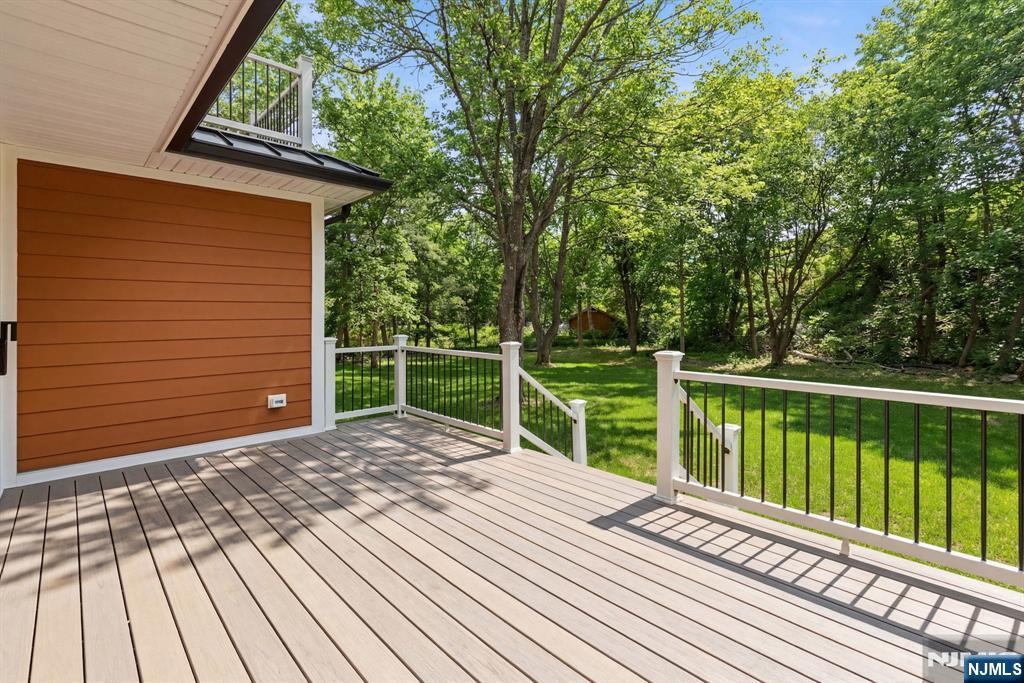 45 Riverview Terrace Mahwah, NJ 07430 - Photo 24 of 25 a view of backyard with wooden floor and fence