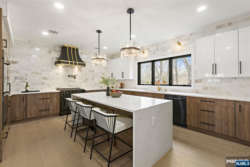 45 Riverview Terrace Mahwah, NJ 07430 - Photo 3 of 25 a kitchen with a table and chairs in it