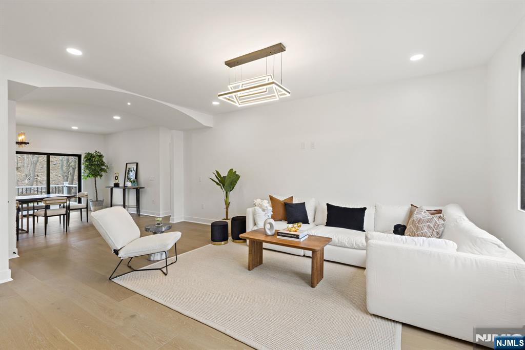 45 Riverview Terrace Mahwah, NJ 07430 - Photo 7 of 25 a living room with furniture and a table