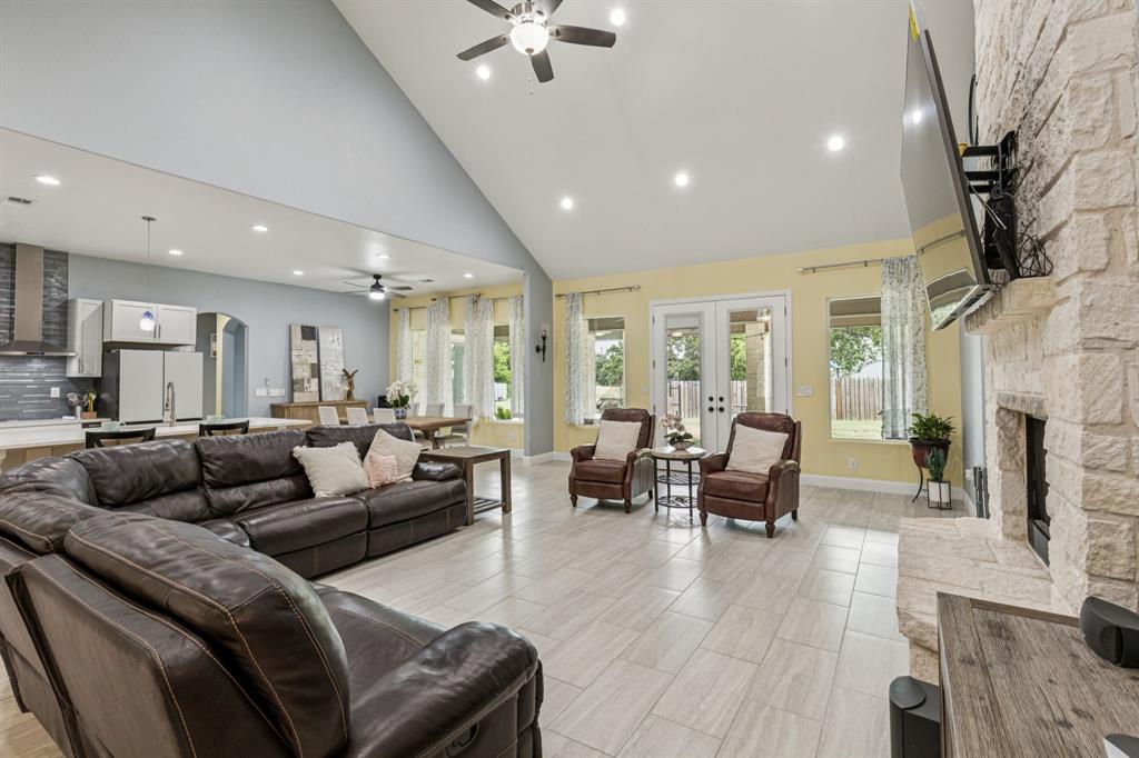 6467 Asher Road Alvarado, TX 76009 - Photo 19 of 40 a living room with furniture and a fireplace