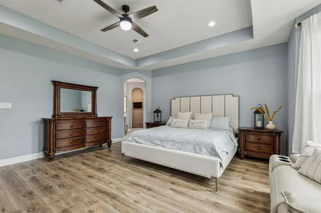 a bedroom with a bed and furniture