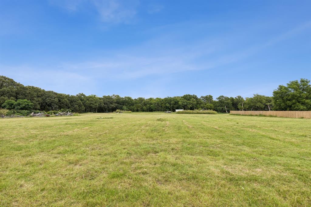 6467 Asher Road Alvarado, TX 76009 - Photo 7 of 40 a view of an ocean and sunset