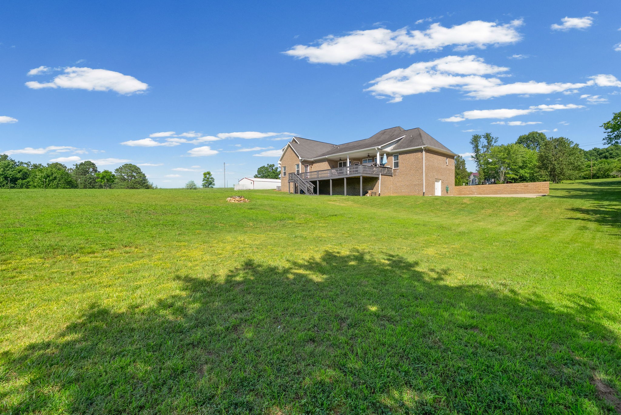 4940 Marion Road Cunningham, TN 37052 - Photo 34 of 43 a front view of a house with a garden