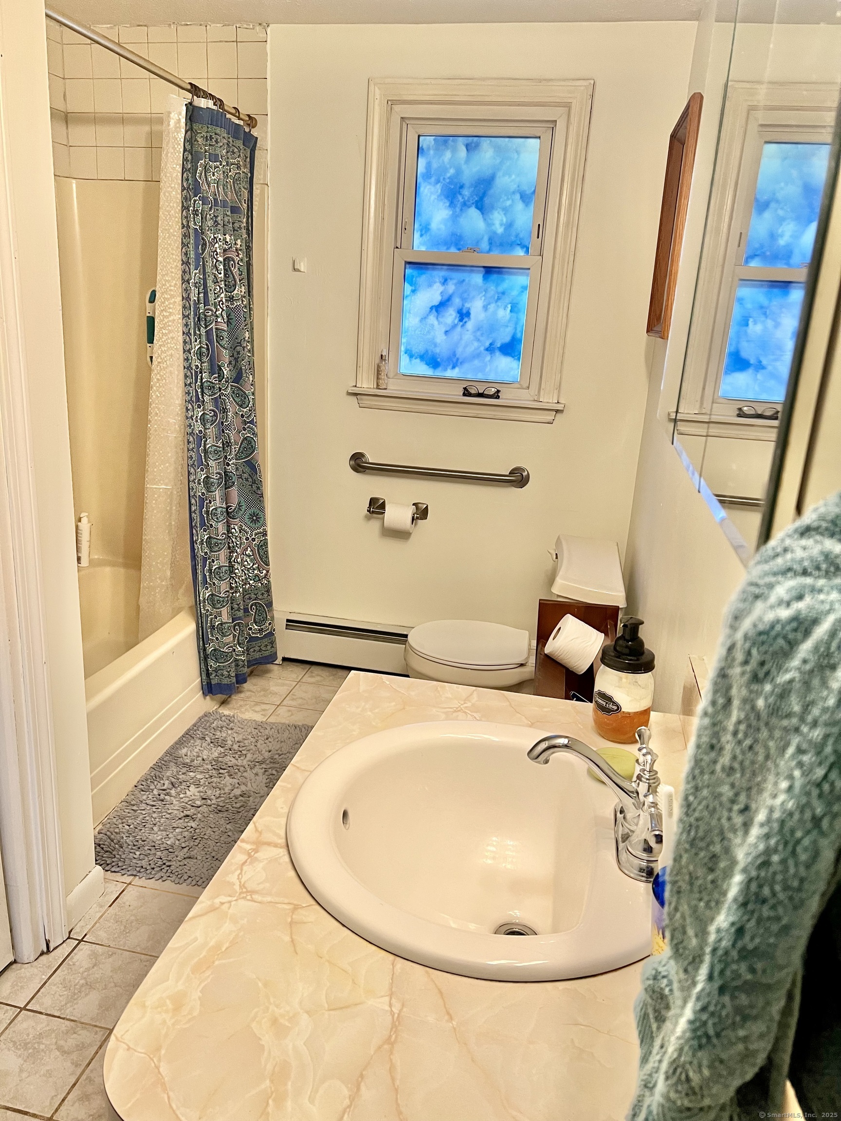 61 Litchfield Road Farmington, CT 06085 - Photo 14 of 27 a bathroom with a sink and a mirror