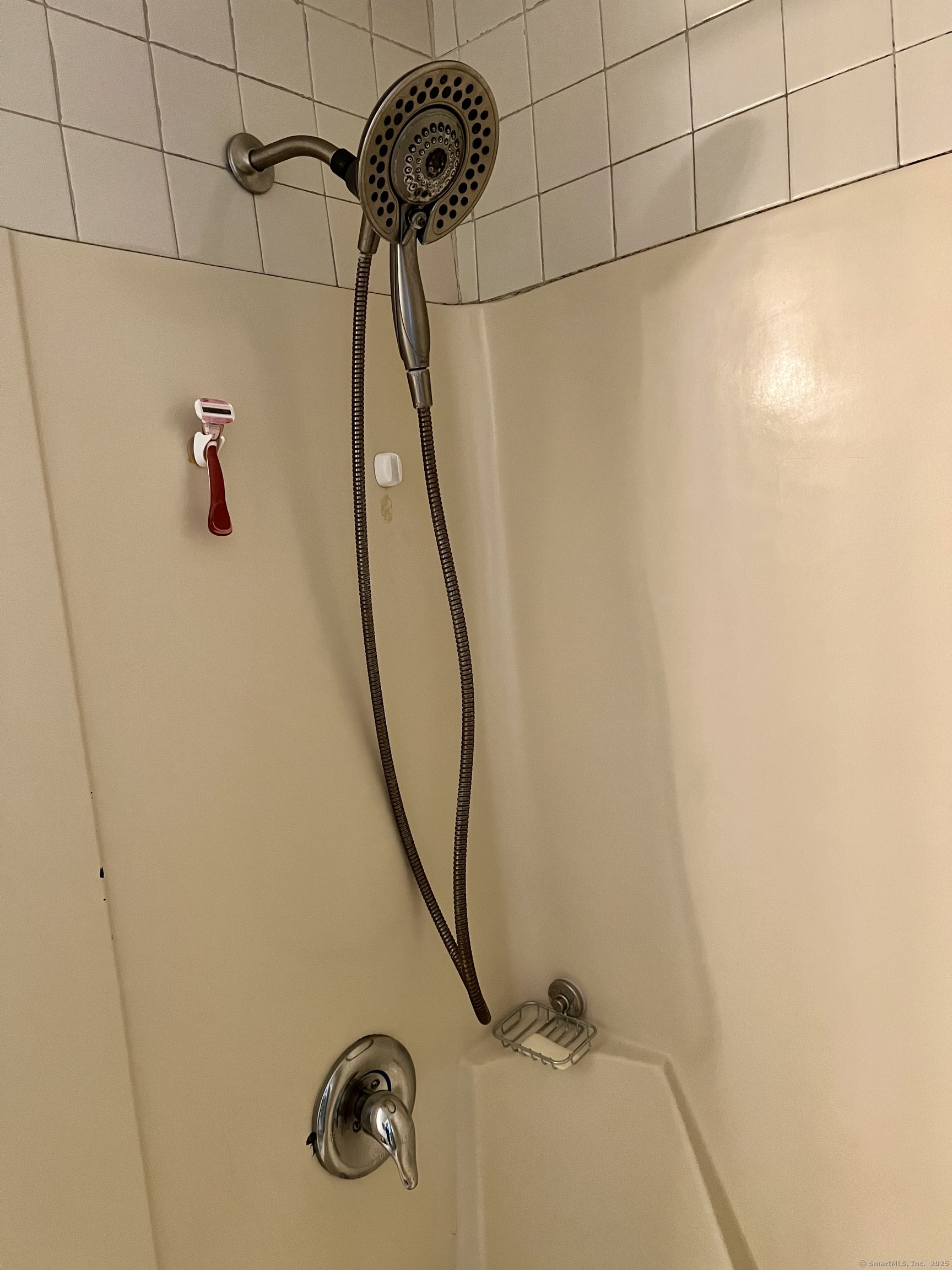 61 Litchfield Road Farmington, CT 06085 - Photo 15 of 27 a bathroom with a shower