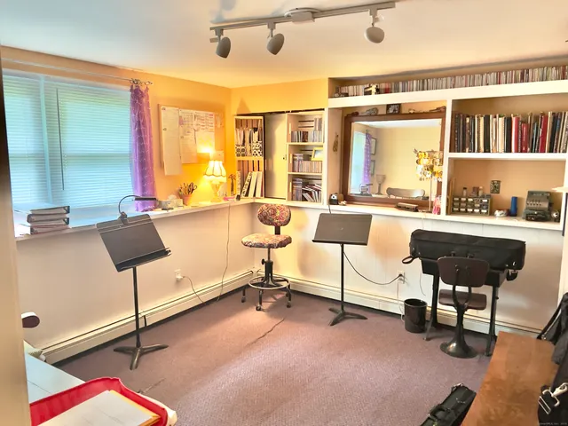 a living room with a couch and a table