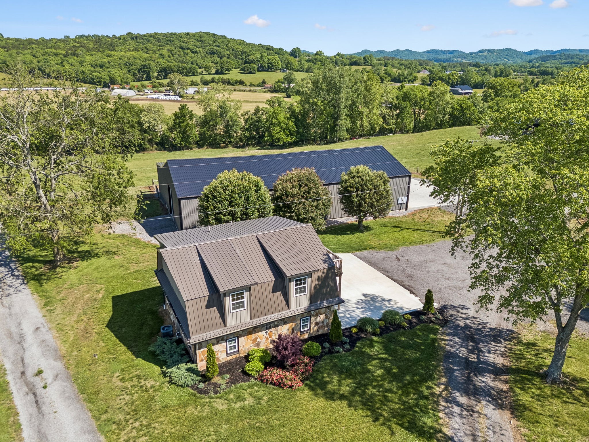 124 Hickman Creek Road South Hickman, TN 38567 - Photo 40 of 45 an aerial view of a house with mountain view