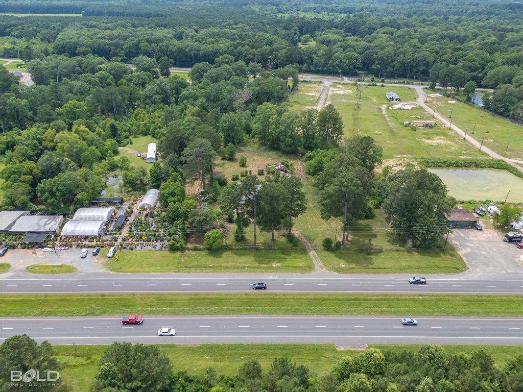 12274 Mansfield Road Keithville, LA 71047 - Photo 3 of 6 a view of a swimming pool and lake view