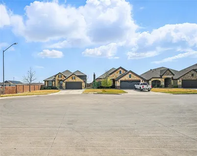 a view of residential houses and city street