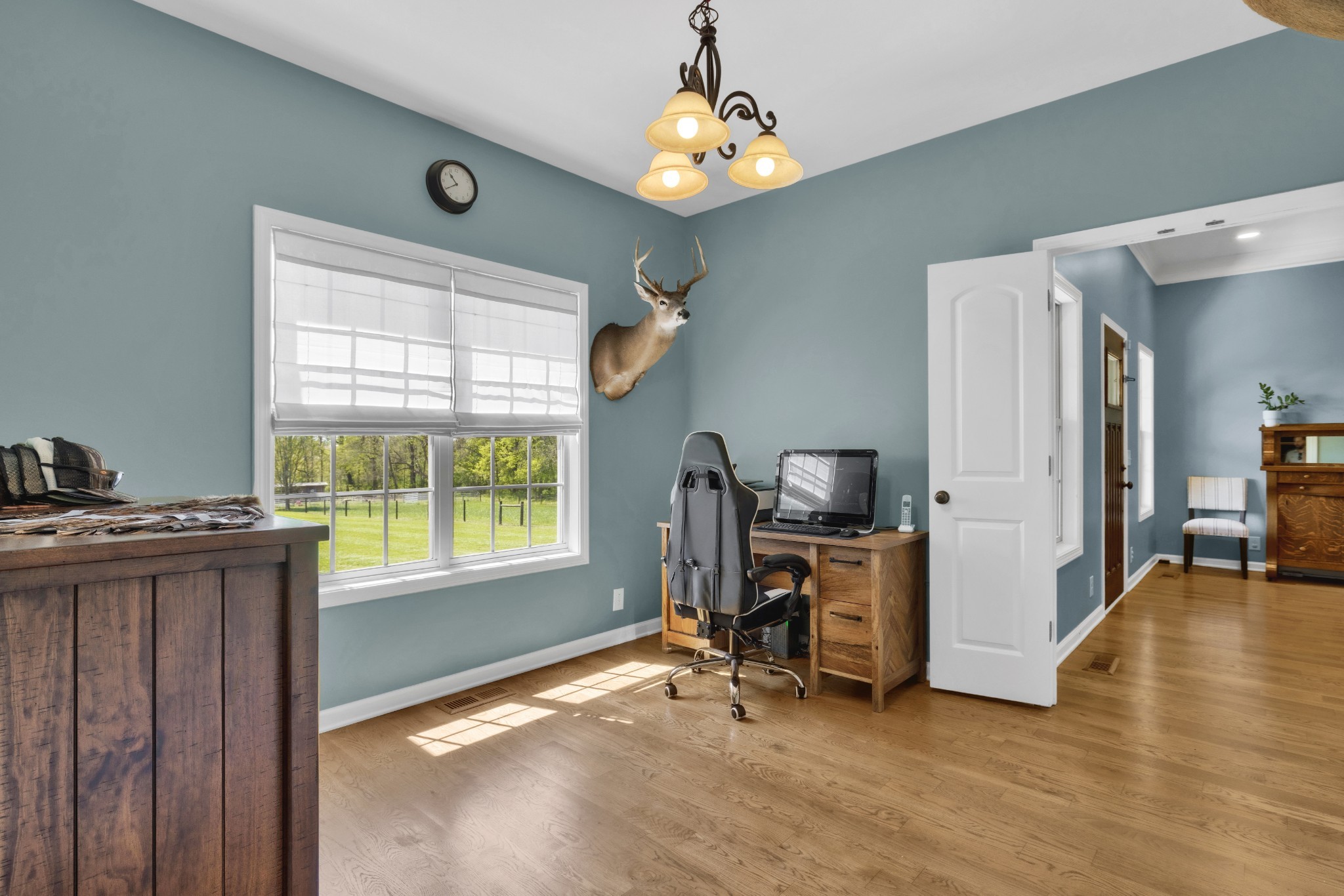 3988 Fykes Grove Road Cedar Hill, TN 37032 - Photo 26 of 50 a view of a workspace with furniture and a window