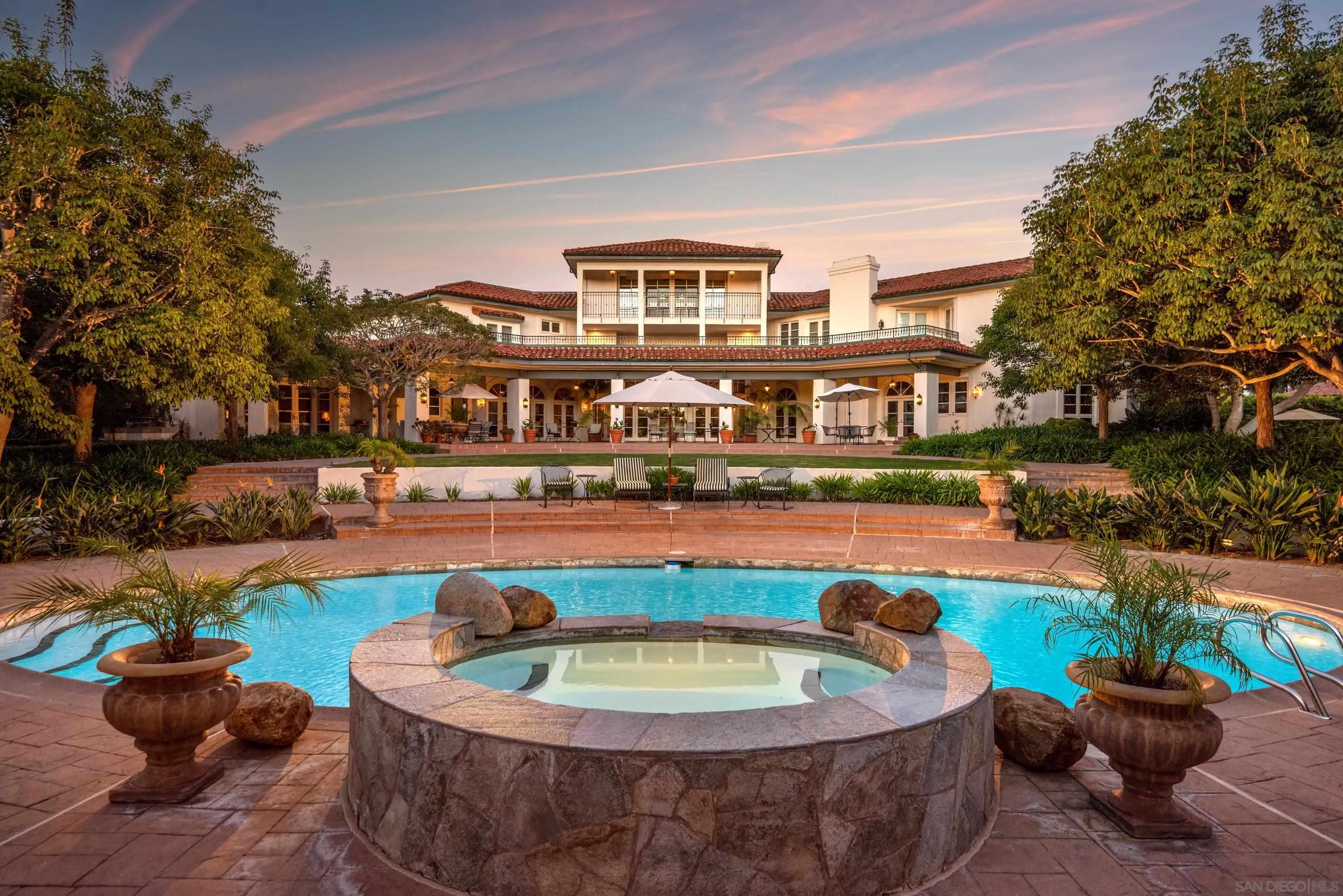 18279 Via De Sueno Rancho Santa Fe, CA 92091 - Photo 1 of 53 a view of a swimming pool with a patio