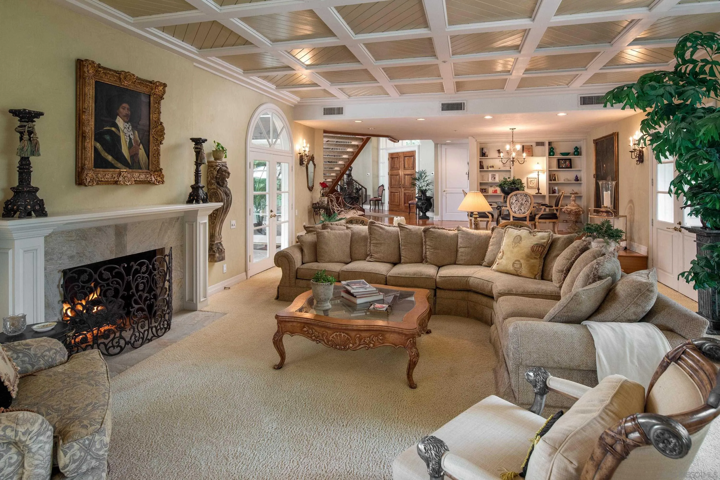 18279 Via De Sueno Rancho Santa Fe, CA 92091 - Photo 13 of 53 a living room with furniture and a fireplace