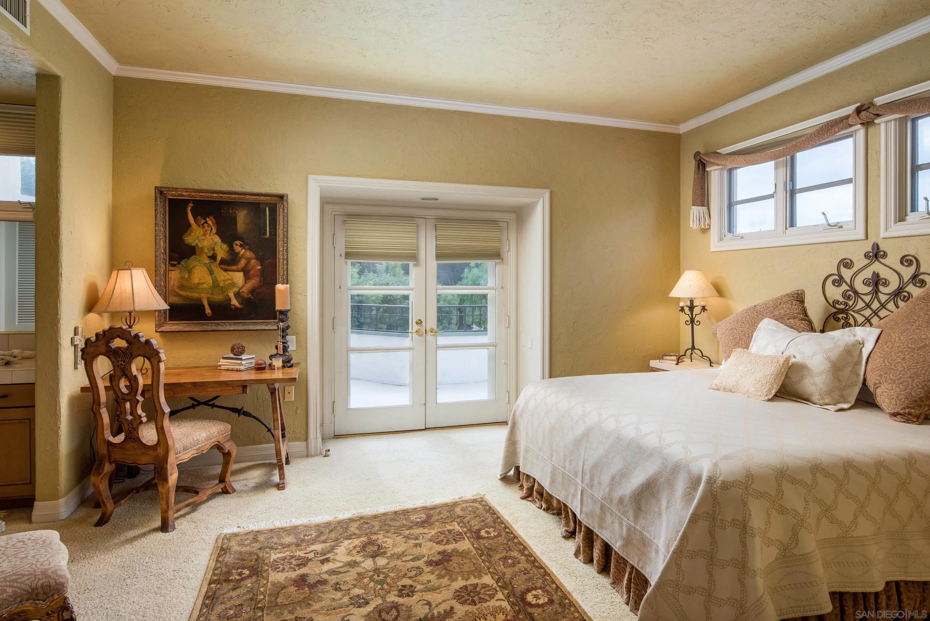 18279 Via De Sueno Rancho Santa Fe, CA 92091 - Photo 23 of 53 a bedroom with a bed and a chair