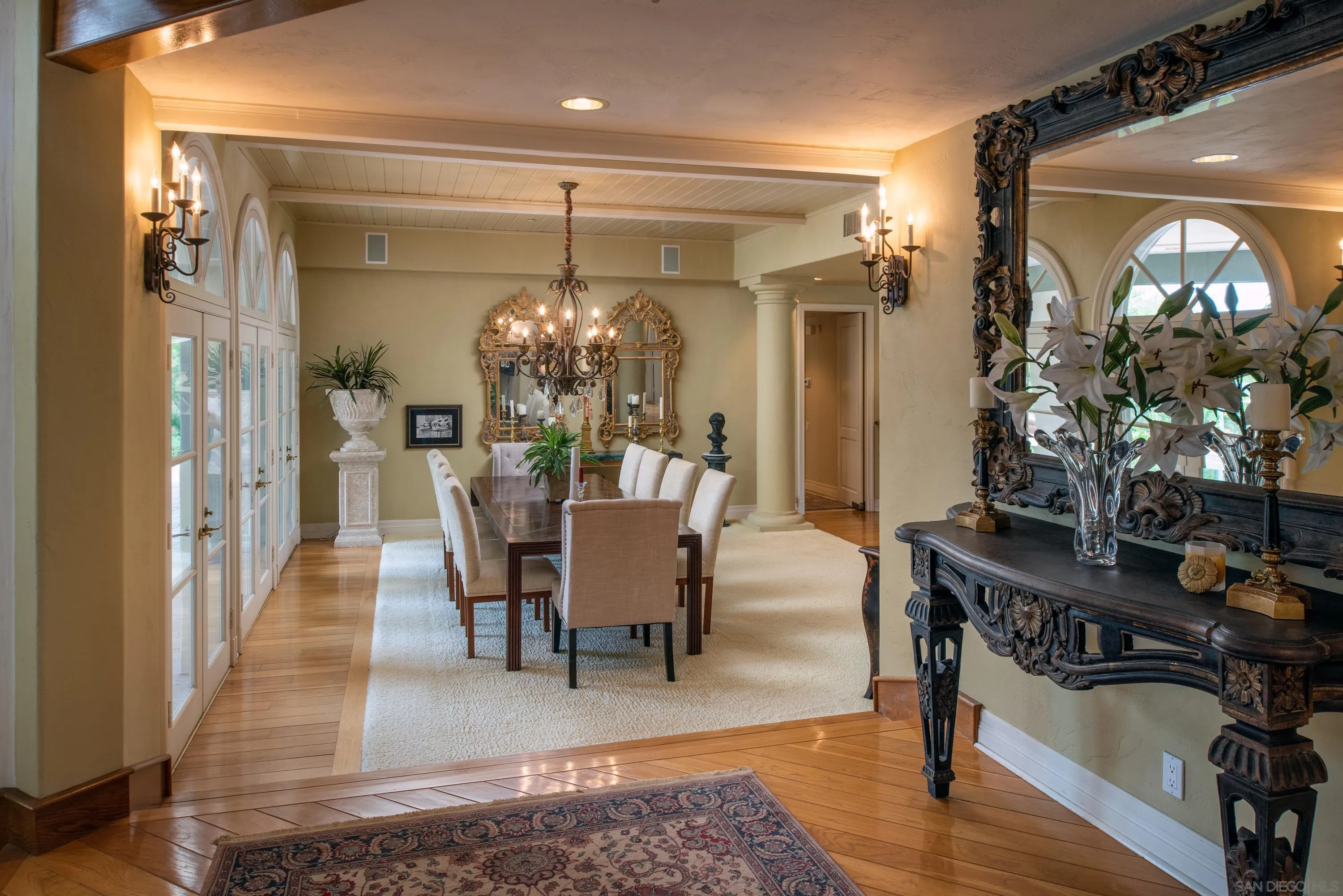 18279 Via De Sueno Rancho Santa Fe, CA 92091 - Photo 31 of 53 a view of a dining room with furniture and wooden floor