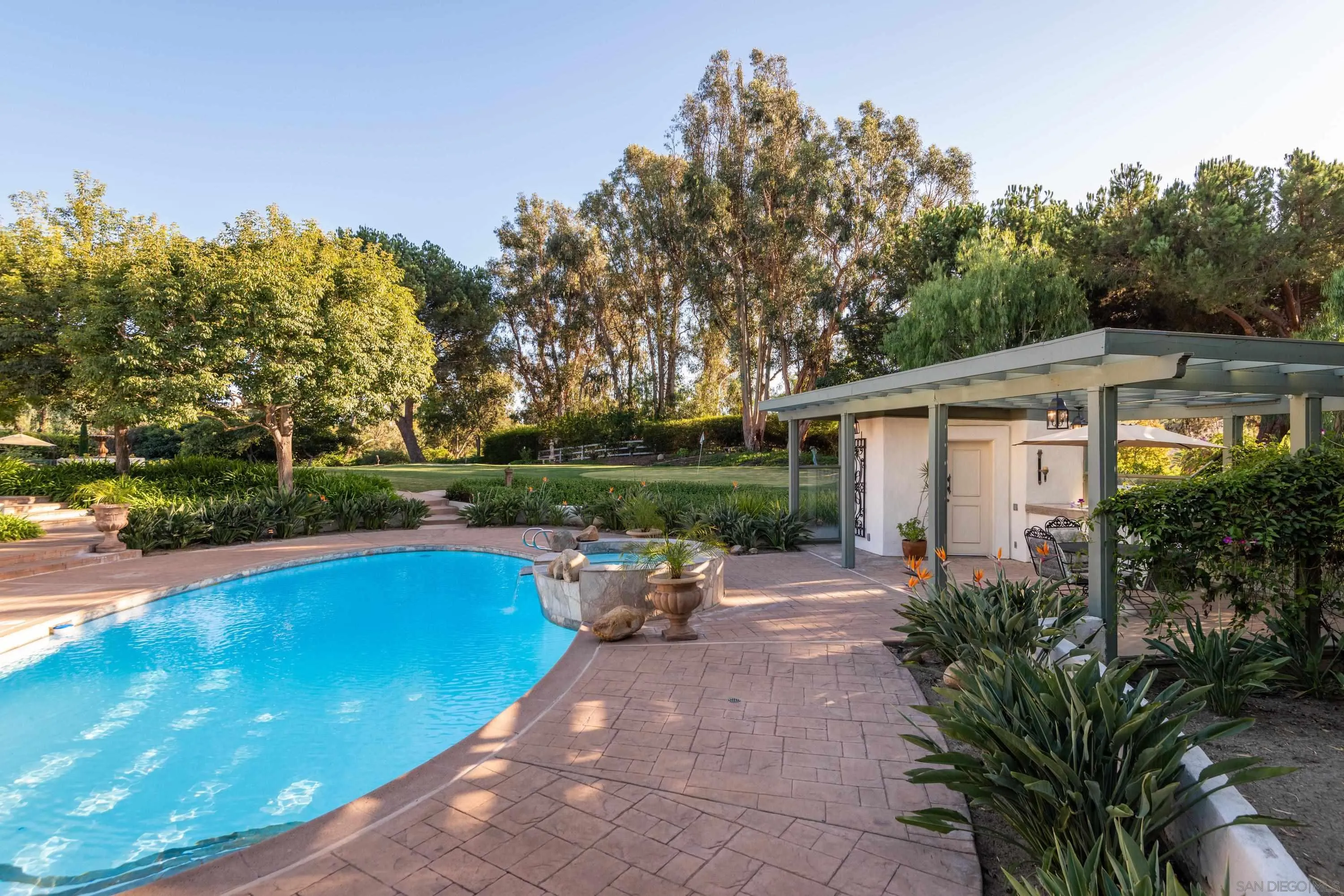 18279 Via De Sueno Rancho Santa Fe, CA 92091 - Photo 35 of 53 a view of a patio with chairs and plants