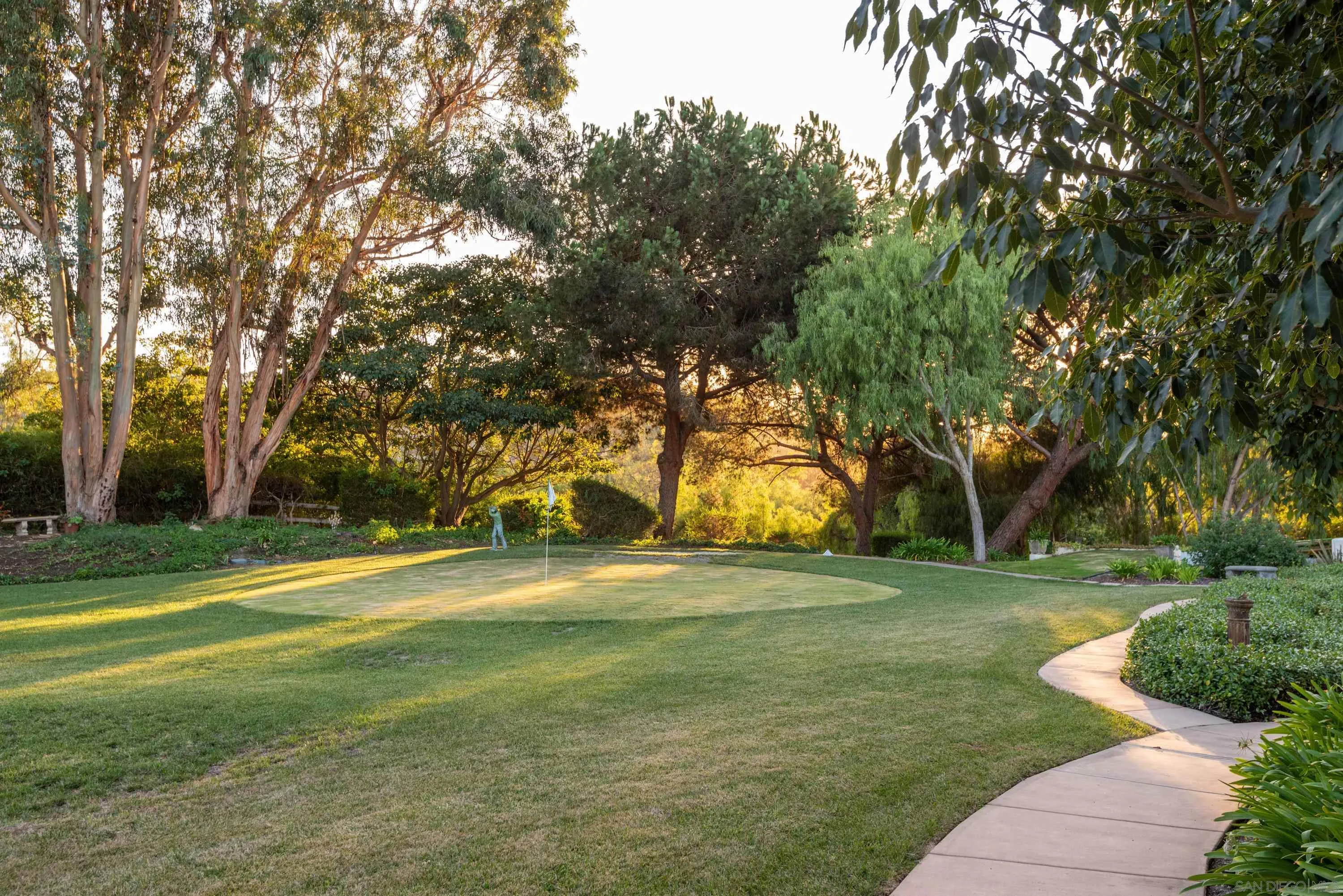 18279 Via De Sueno Rancho Santa Fe, CA 92091 - Photo 36 of 53 a garden view with a fountain