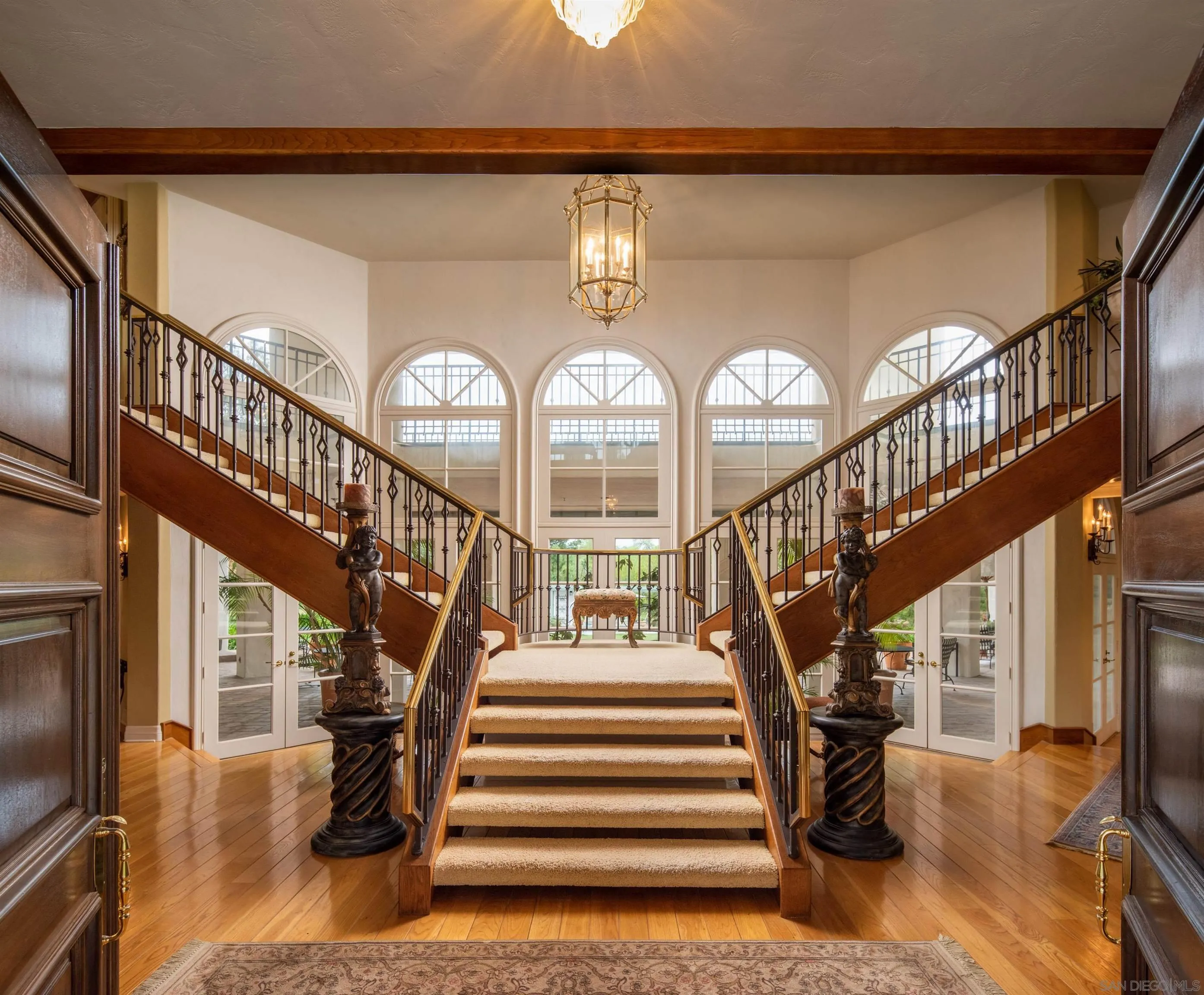 18279 Via De Sueno Rancho Santa Fe, CA 92091 - Photo 43 of 53 a view of entryway and hall with wooden floor
