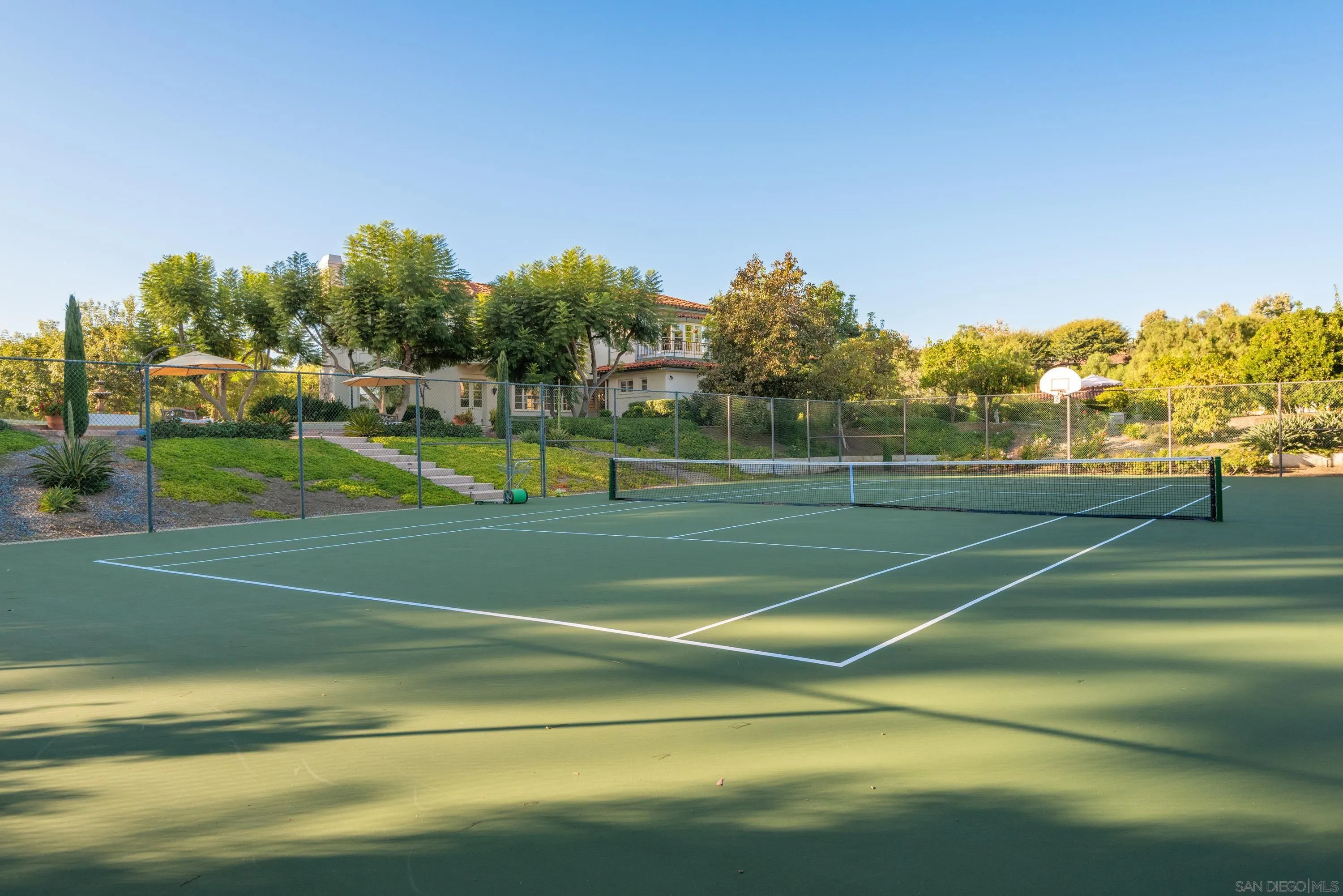 18279 Via De Sueno Rancho Santa Fe, CA 92091 - Photo 5 of 53 a view of a tennis court