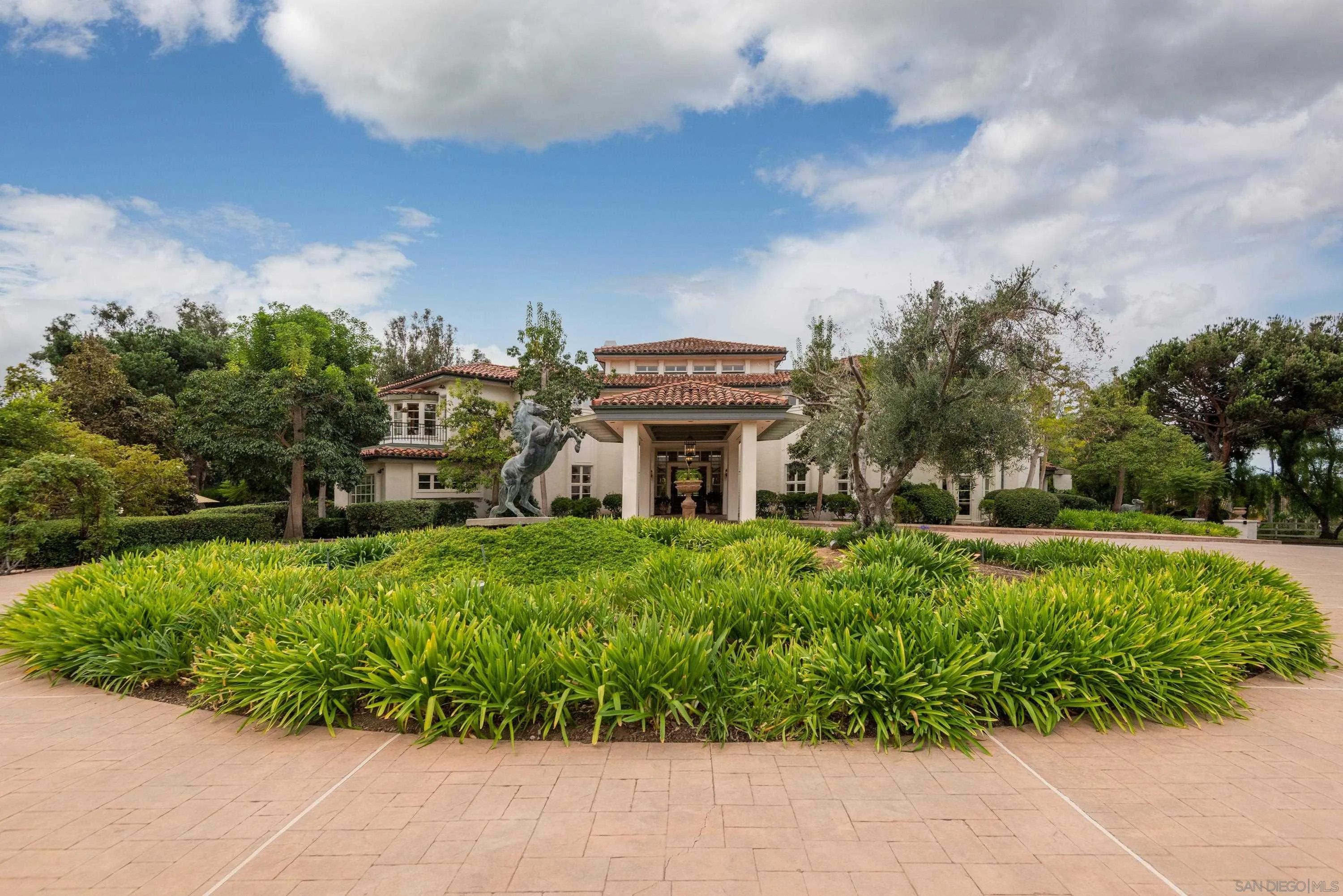 18279 Via De Sueno Rancho Santa Fe, CA 92091 - Photo 53 of 53 a front view of a house with a yard