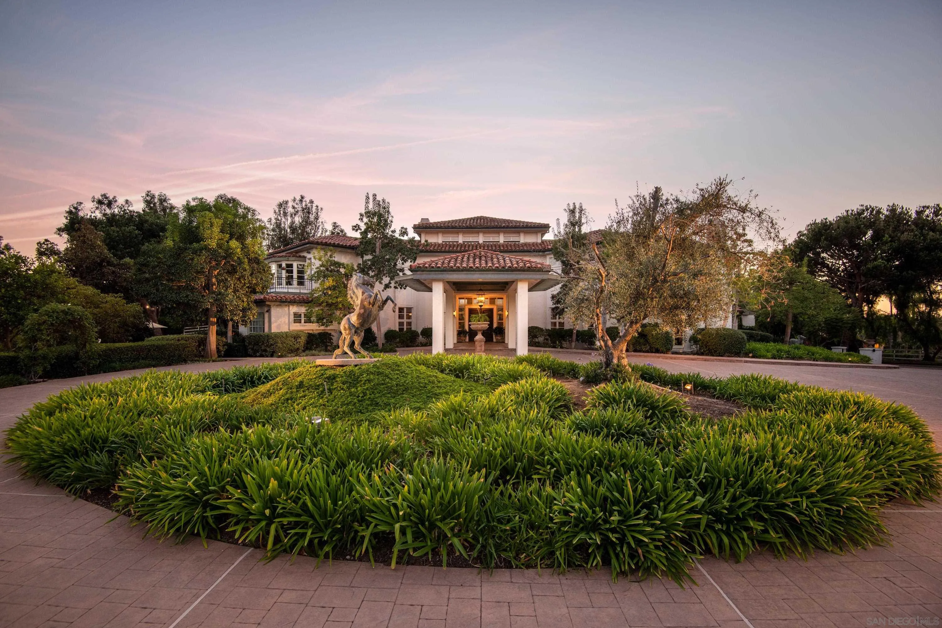 18279 Via De Sueno Rancho Santa Fe, CA 92091 - Photo 9 of 53 a front view of a house with a yard