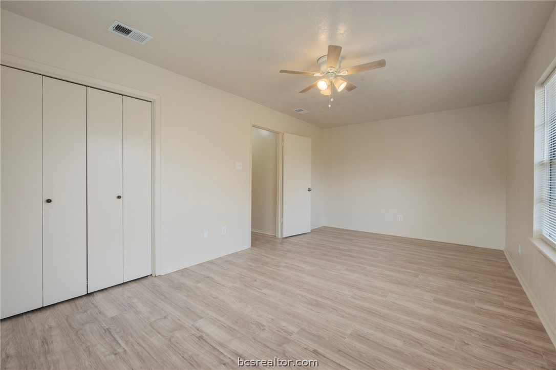 4752 Brompton Lane Bryan, TX 77802 - Photo 11 of 17 Primary bedroom view from window walls