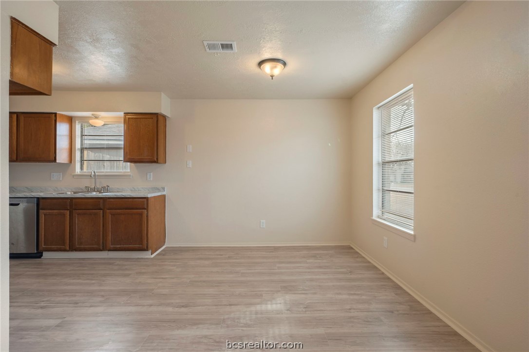 4752 Brompton Lane Bryan, TX 77802 - Photo 5 of 17 Breakfast area opens to kitchen and living area