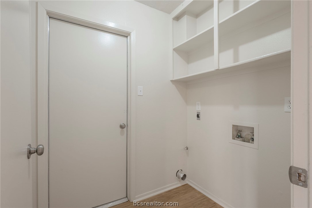 4752 Brompton Lane Bryan, TX 77802 - Photo 7 of 17 Utility room is located close the bedrooms making it convenient for use