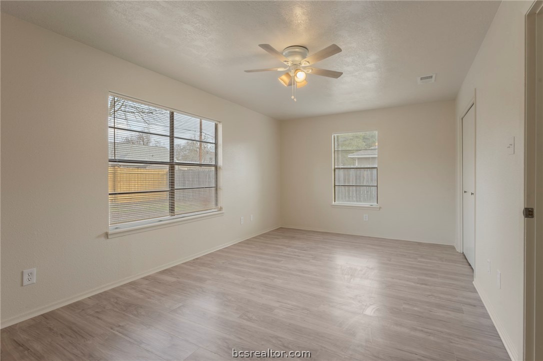 4752 Brompton Lane Bryan, TX 77802 - Photo 10 of 17 Oversized primary bedroom provides ample space for adding a sitting area