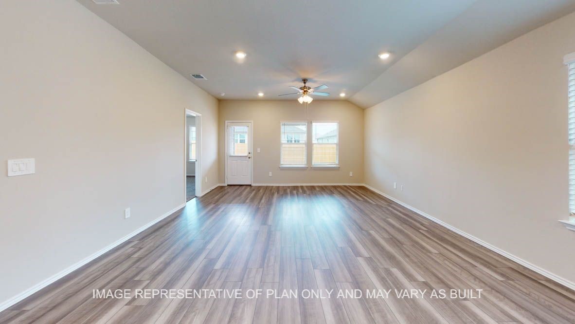 5705 Spoonbill Lane Orange, TX 77632 - Photo 7 of 15 wooden floor in an empty room with a window