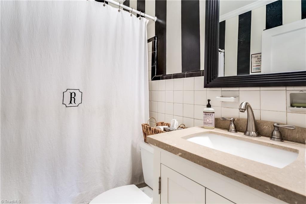 1503 Independence Road Greensboro, NC 27408 - Photo 22 of 25 Hall Bathroom