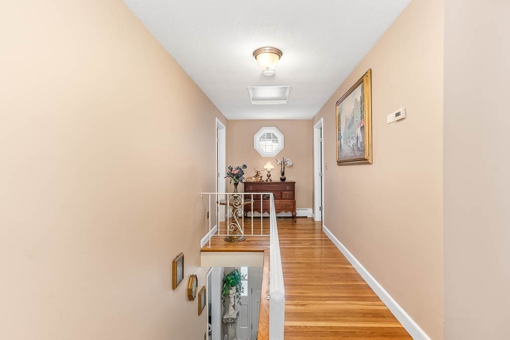 70 Deerfield Road Sharon, MA 02067 - Photo 13 of 29 a view of a hallway with furniture