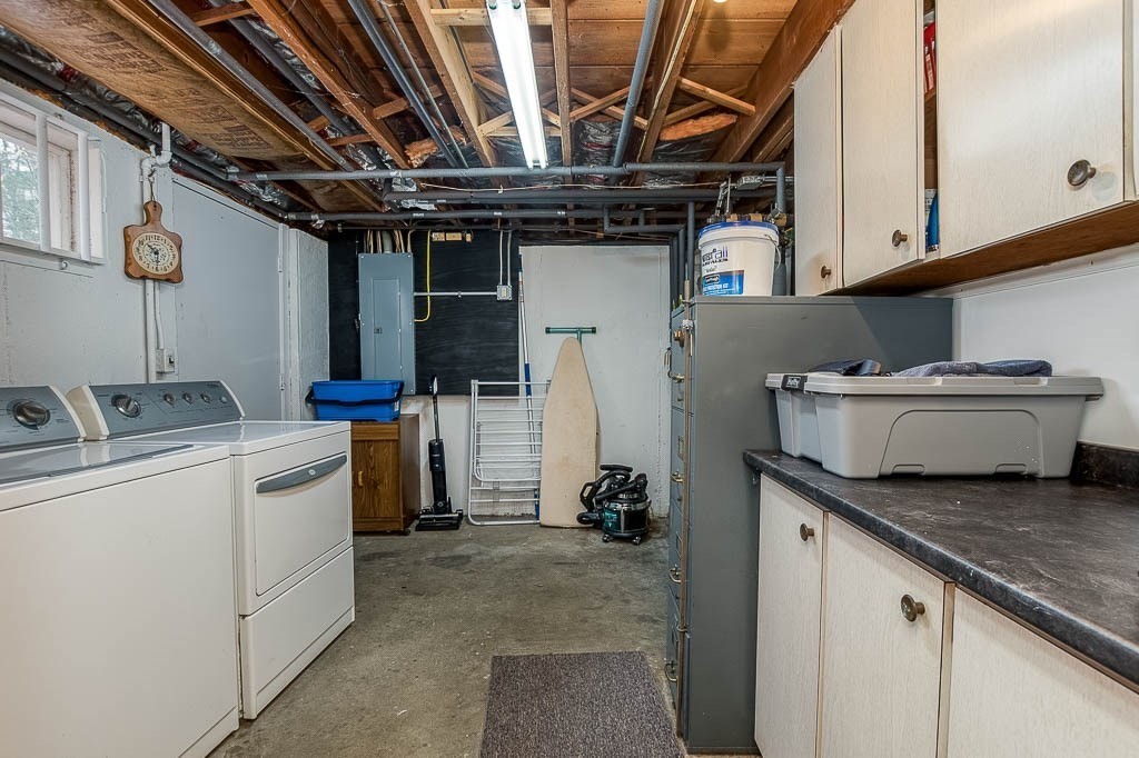 70 Deerfield Road Sharon, MA 02067 - Photo 25 of 29 a utility room with dryer and washer