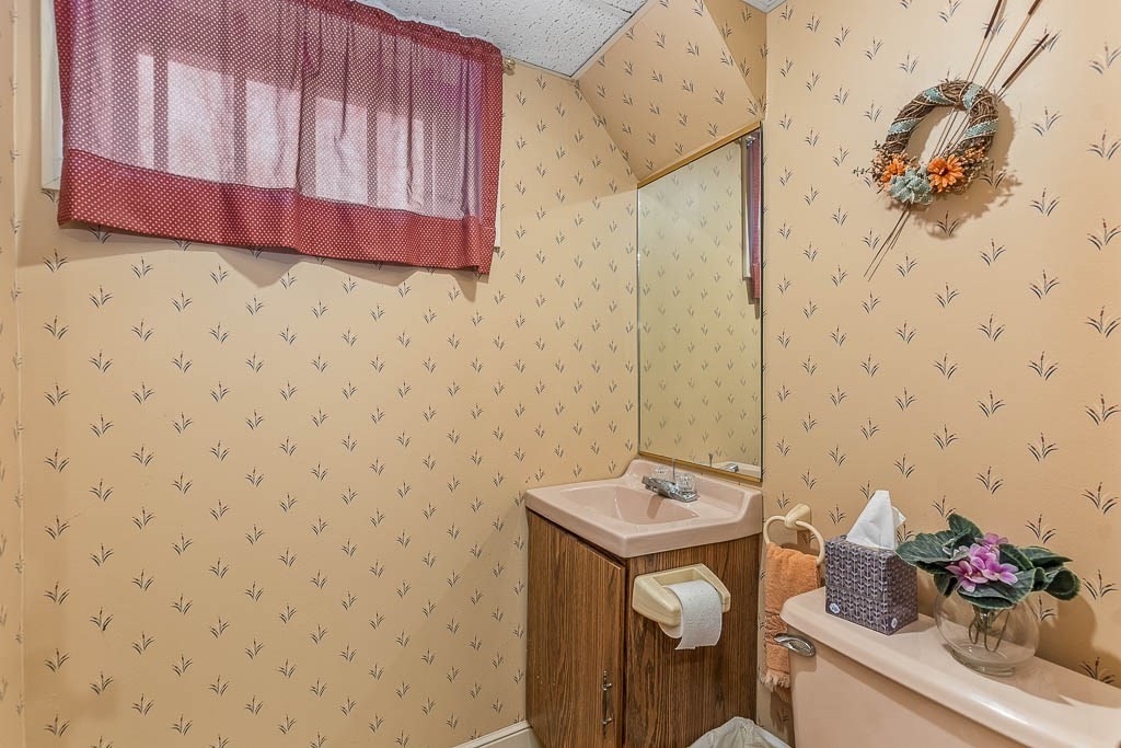 70 Deerfield Road Sharon, MA 02067 - Photo 27 of 29 a bathroom with a sink toilet and shower