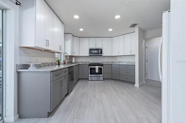 a view of a backyard with a patio